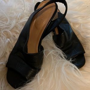 Bueno soft black leather sling backs